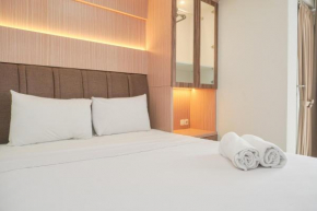 Modern Look and Homey 1BR at Gold Coast Apartment By Travelio